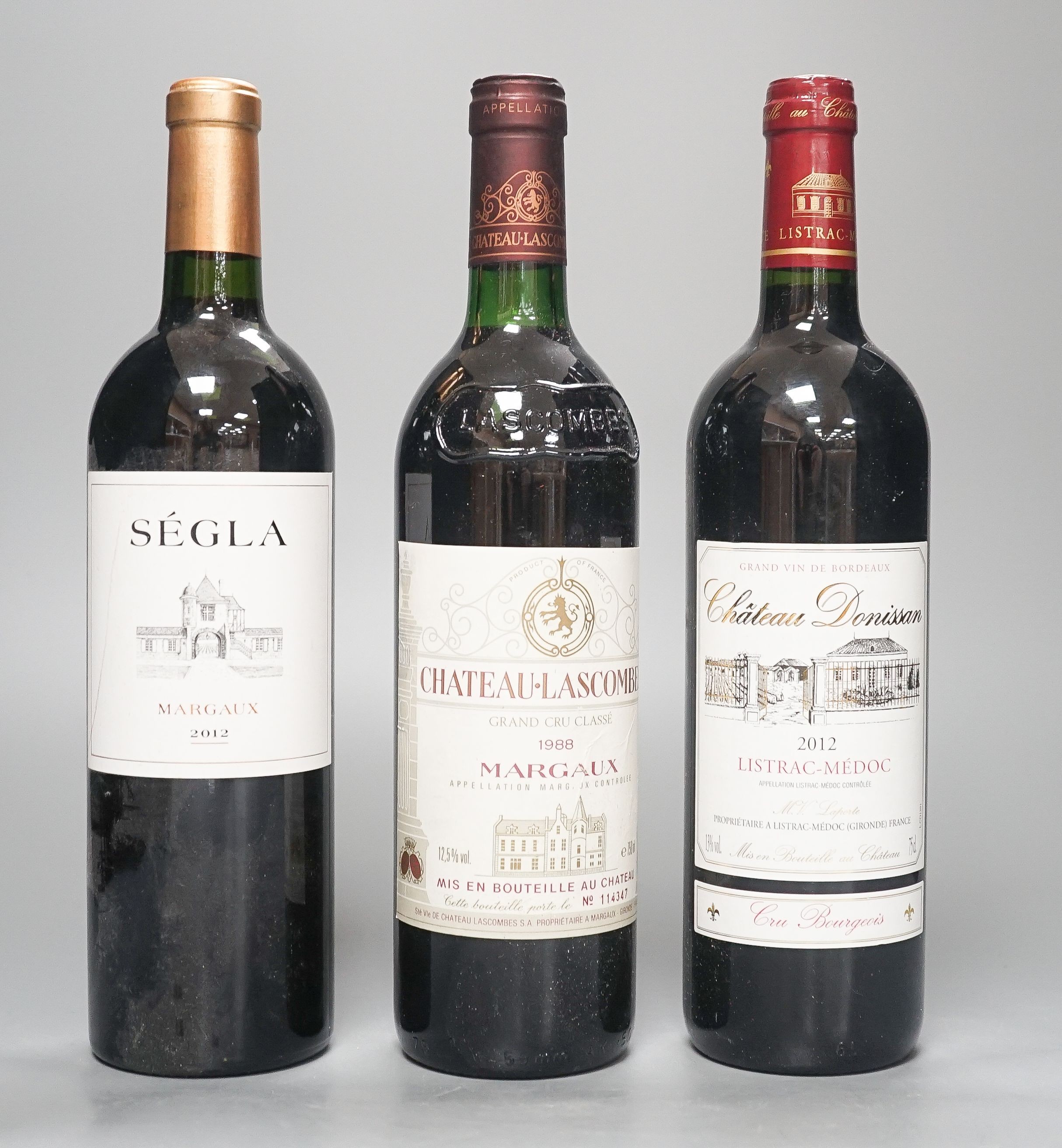 Seven assorted Bordeaux wines, including Segla, Margaux, 2012, Moulin de la Bridane, St. Julien, 2013, La CroixTaillefer, Pomerol, 2014, Borgneuf, Pomerol, 2008 and Lascombes, Margaux, 1988 and one bottle of Chateau Musa